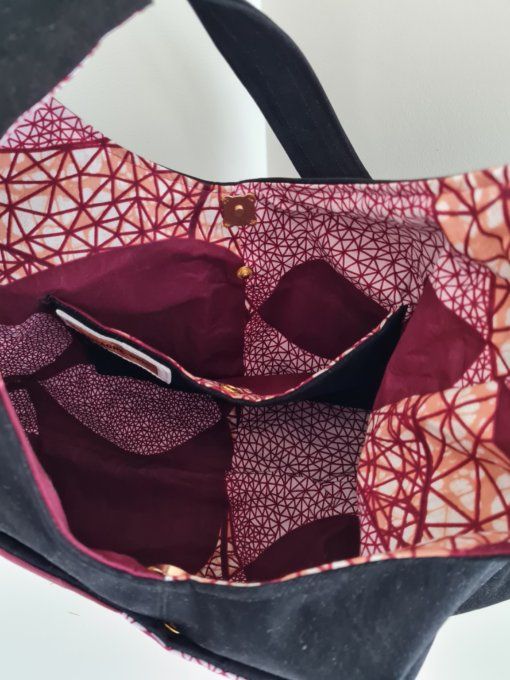 PORTÉ EPAULE NOIR ET WAX